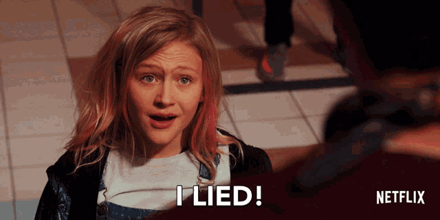 a girl with red hair says " i lied " in front of a netflix logo