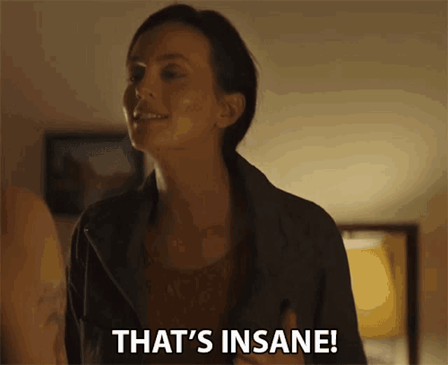 a woman says that 's insane in front of a man