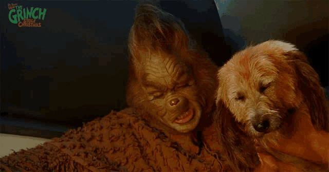 a poster for the movie grinch the christmas shows a grinch and a dog