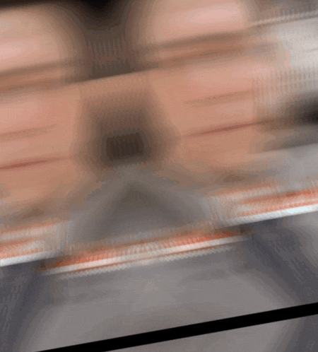 a blurry picture of a person 's face with a few lines