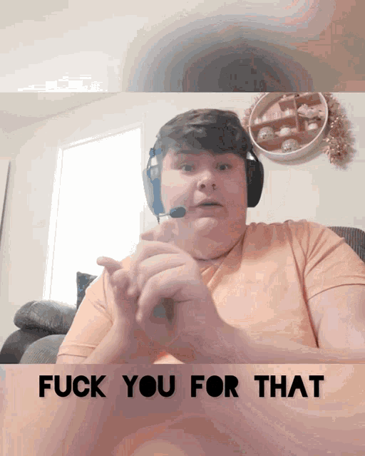 a man wearing headphones with the words fuck you for that below him