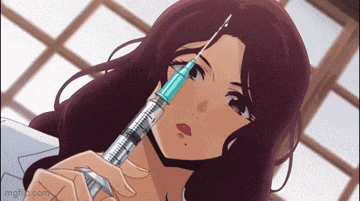 a woman is holding a syringe in front of her face