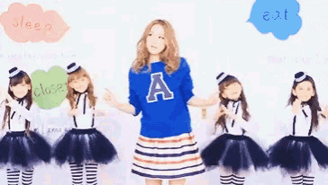 a girl with the letter a on her shirt