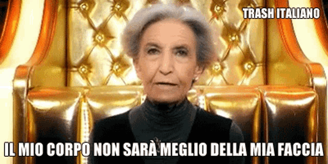 an elderly woman is sitting in a chair with the words trash italiano written on the bottom