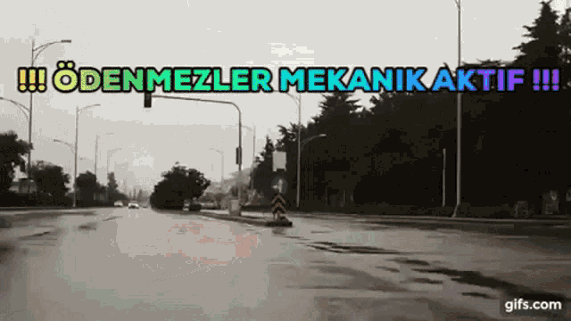 a black and white photo of a street with the words ' odenmezler mekanikaktif ' written above it