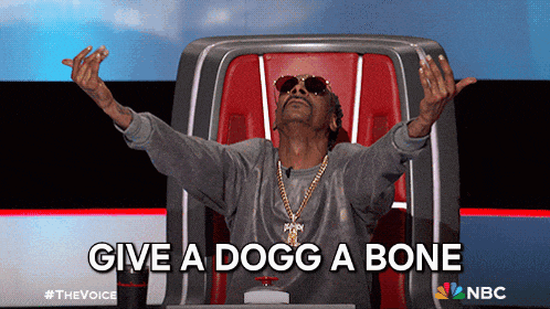 snoop dogg is sitting in a chair with his arms outstretched and the words give a dogg a bone below him