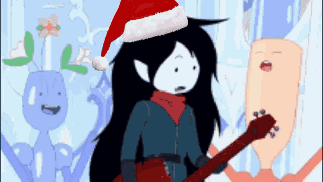 a girl wearing a santa hat is holding a guitar