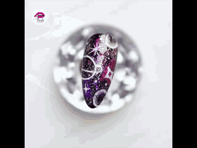 a close up of a nail with the word nails on it