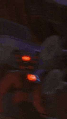 a cartoon of a man with a huge smile on his face in front of a fireball