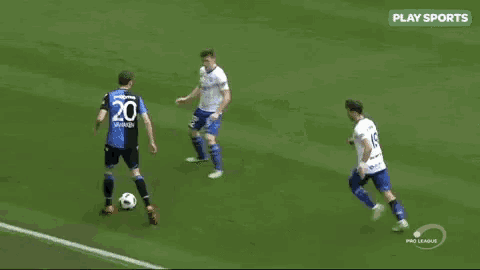a group of soccer players are playing a game on a soccer field .
