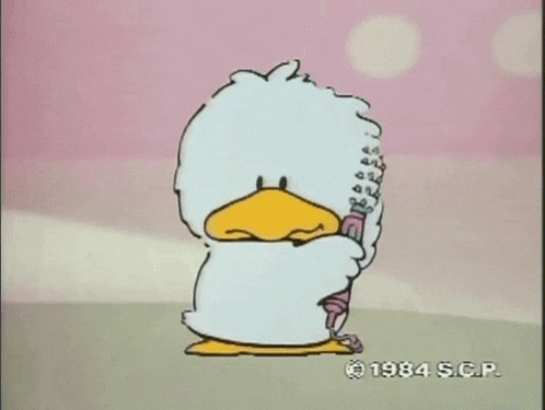 a cartoon of a duck holding a brush with the year 1984 on the bottom