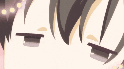 a close up of a cartoon character 's eyes with a white background .