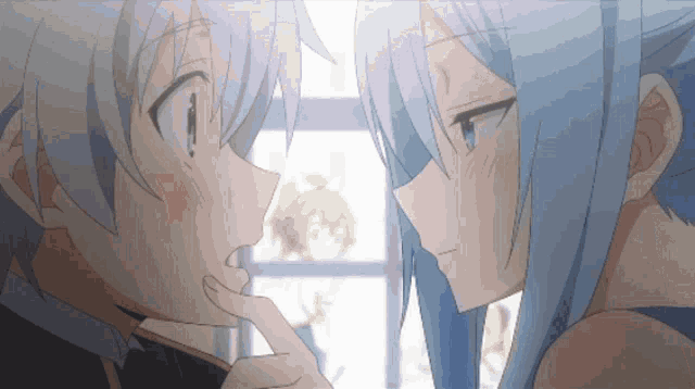 a boy and a girl are touching each other 's faces in an anime scene
