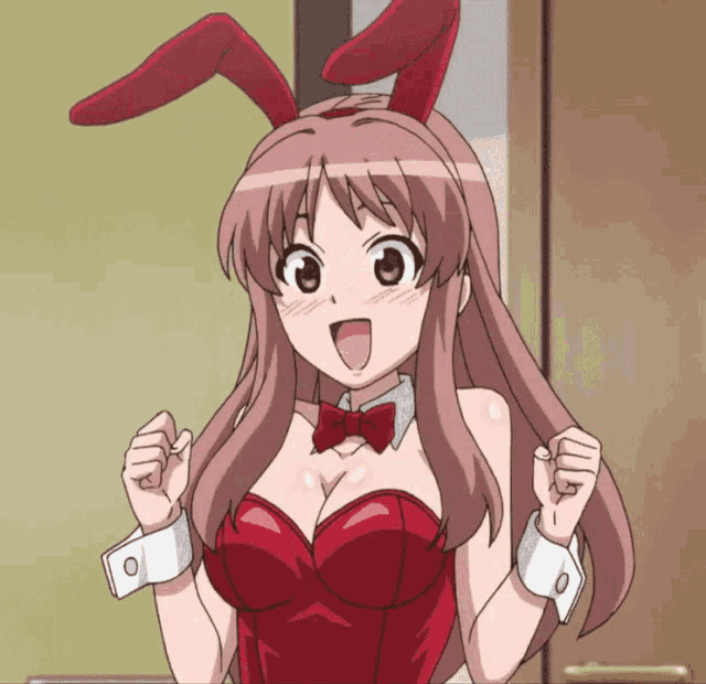 a girl wearing bunny ears and a bow tie