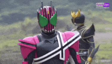 a couple of kamen riders are standing next to each other .
