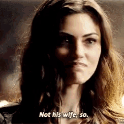 a woman is saying " not his wife so " in a dark room