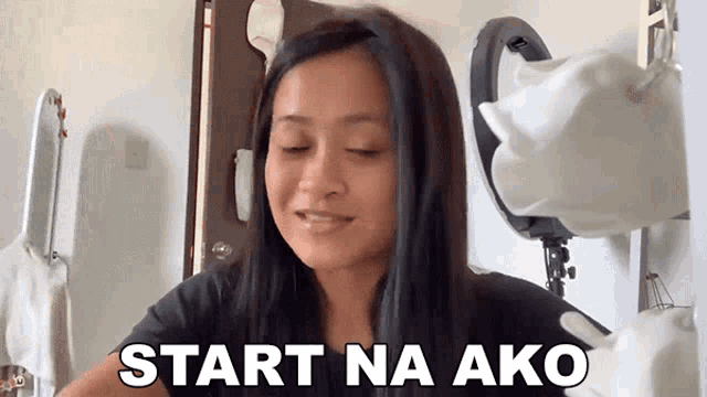 a woman says " start na ako " while looking at herself in the mirror