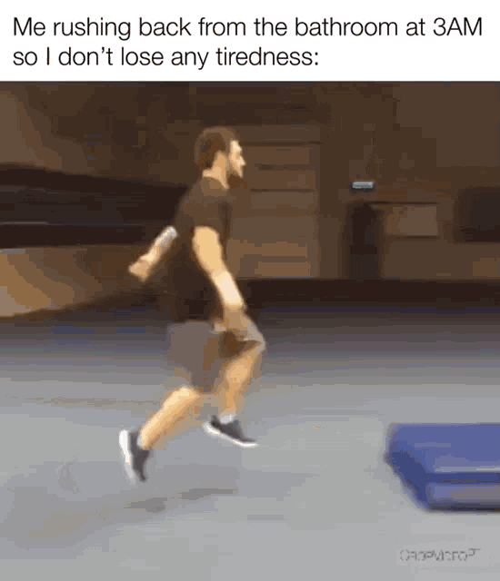 a man is running from the bathroom at 3am so he doesn 't lose any tiredness