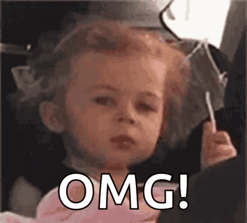 a little girl with curlers in her hair is holding a lollipop and saying omg