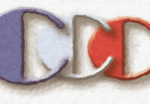 the letters ccd are painted in different colors on a white surface