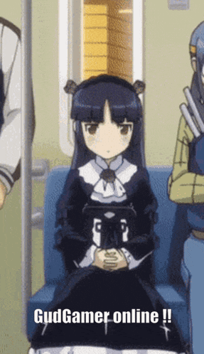 a girl in a black dress is sitting on a blue couch with the words gudgamer online written on the bottom