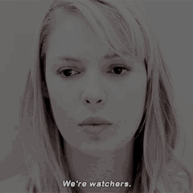 a close up of a woman 's face with the words we 're watchers below her