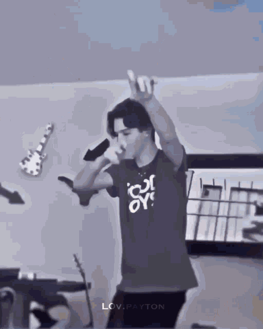 a man wearing a t-shirt that says ice on it