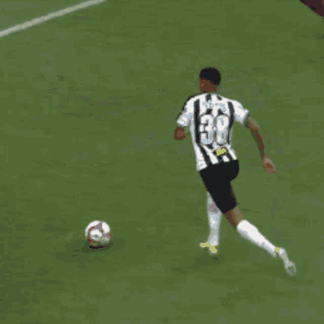a soccer player with the number 23 on the back of his shirt