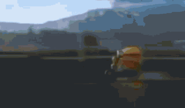 a blurry picture of a person standing in front of a mountain range