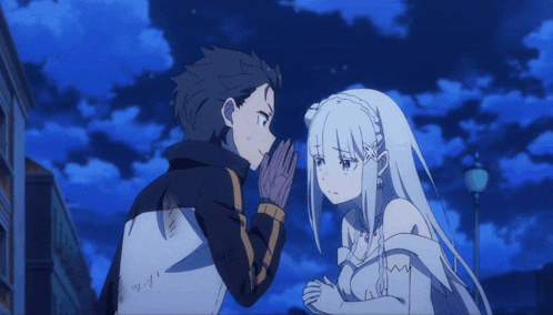a man and a woman are standing next to each other with their hands folded