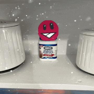a jar of argo baking powder with a smiley face on top