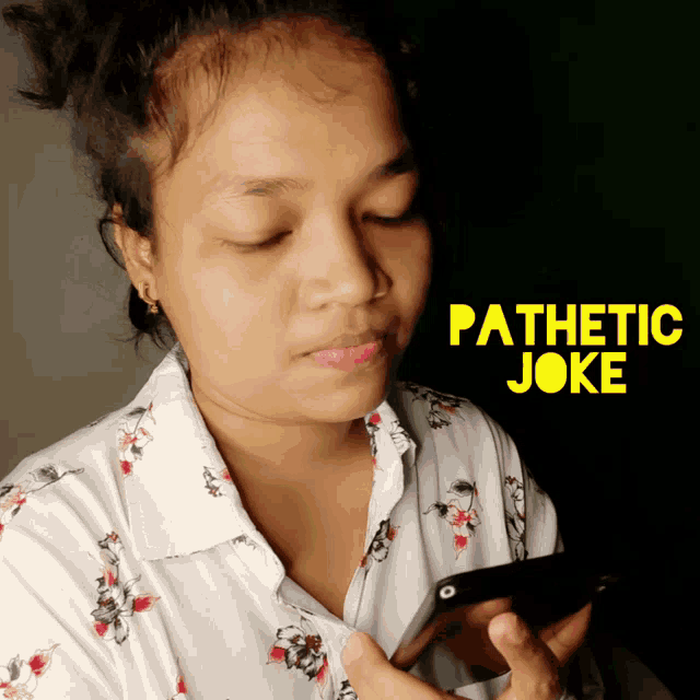 a woman holding a cell phone with the words pathetic joke on the bottom right