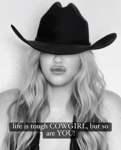 a woman wearing a cowboy hat with the words life is tough cowgirl but so are you below her