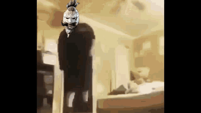 a painting of a man in a mask standing in a room