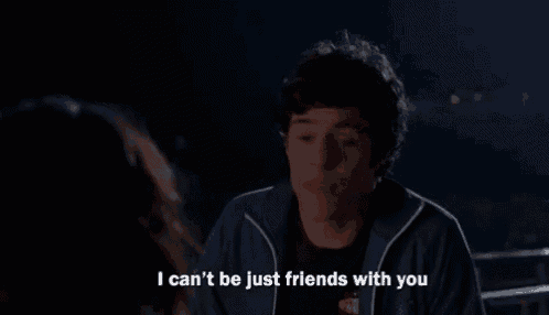 a man talking to a woman with the words i can 't be just friends with you