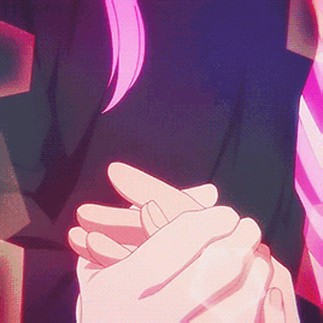a person with pink hair is holding another persons hand