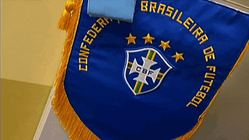a blue banner that says brasileira de futebol on it