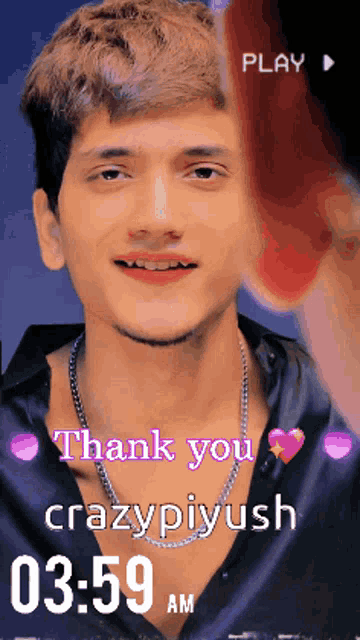 a young man is wearing a black shirt with a chain around his neck and says thank you crazypiyush
