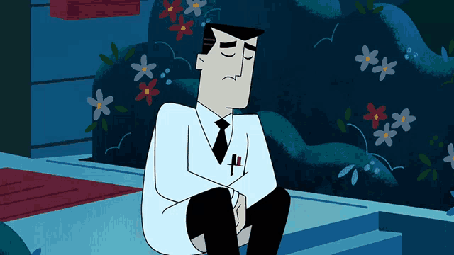 a man in a lab coat and tie sits on a set of stairs