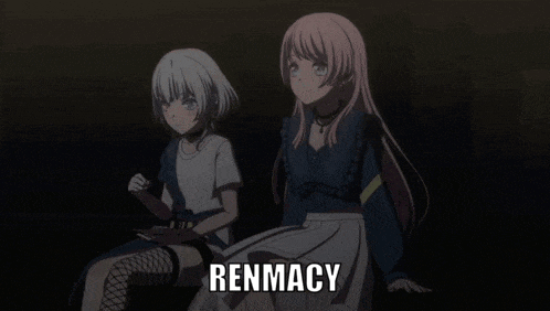 two anime girls are sitting next to each other and the word renmacy is on the bottom right