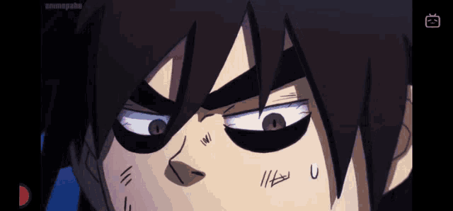 a close up of a cartoon character with a surprised look on his face .