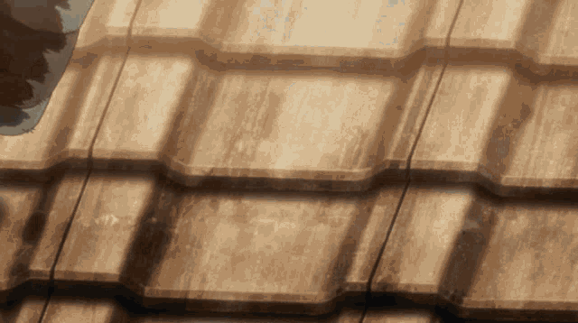 a close up of a wooden roof with a few lines visible