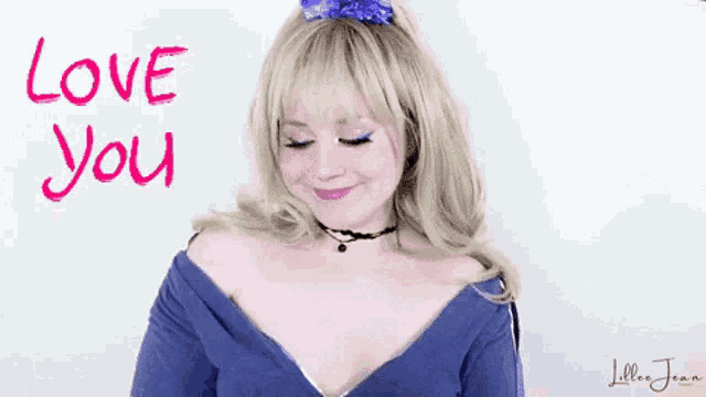 a woman wearing a choker and a purple flower in her hair says " love you "