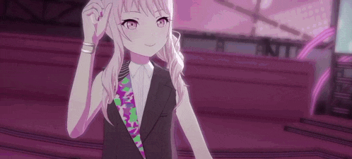 a girl in a suit and tie is standing on a stage in a purple room .