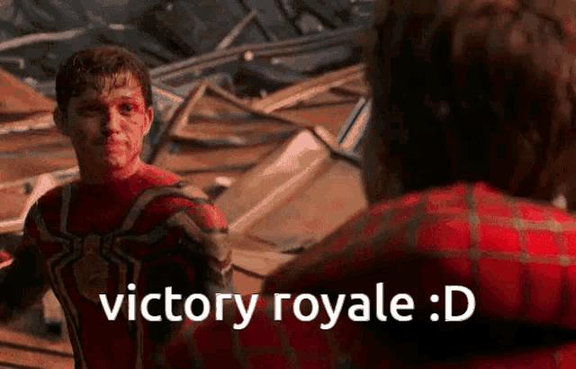 a man in a spiderman costume is standing next to another man with the words victory royale : d on the bottom