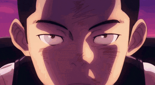 a close up of a man 's face with a purple sky behind him