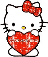hello kitty is holding a red heart with the words `` good morning '' on it .