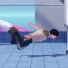 a man is doing a handstand on the floor