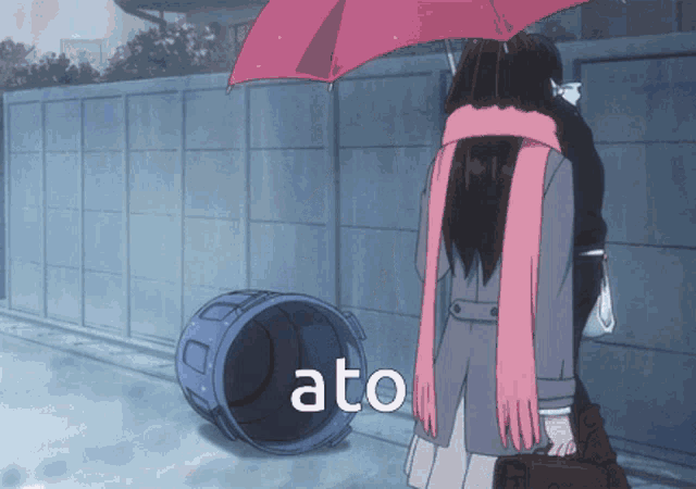 a couple standing under an umbrella with the word ato on the bottom right