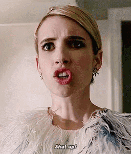 a woman wearing a fur coat is making a funny face and says `` shut up '' .